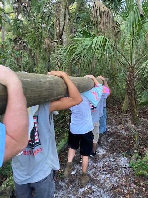 Close-up of Amanda Seeley's wood-burned National Park Maine sign with lighthouse detail